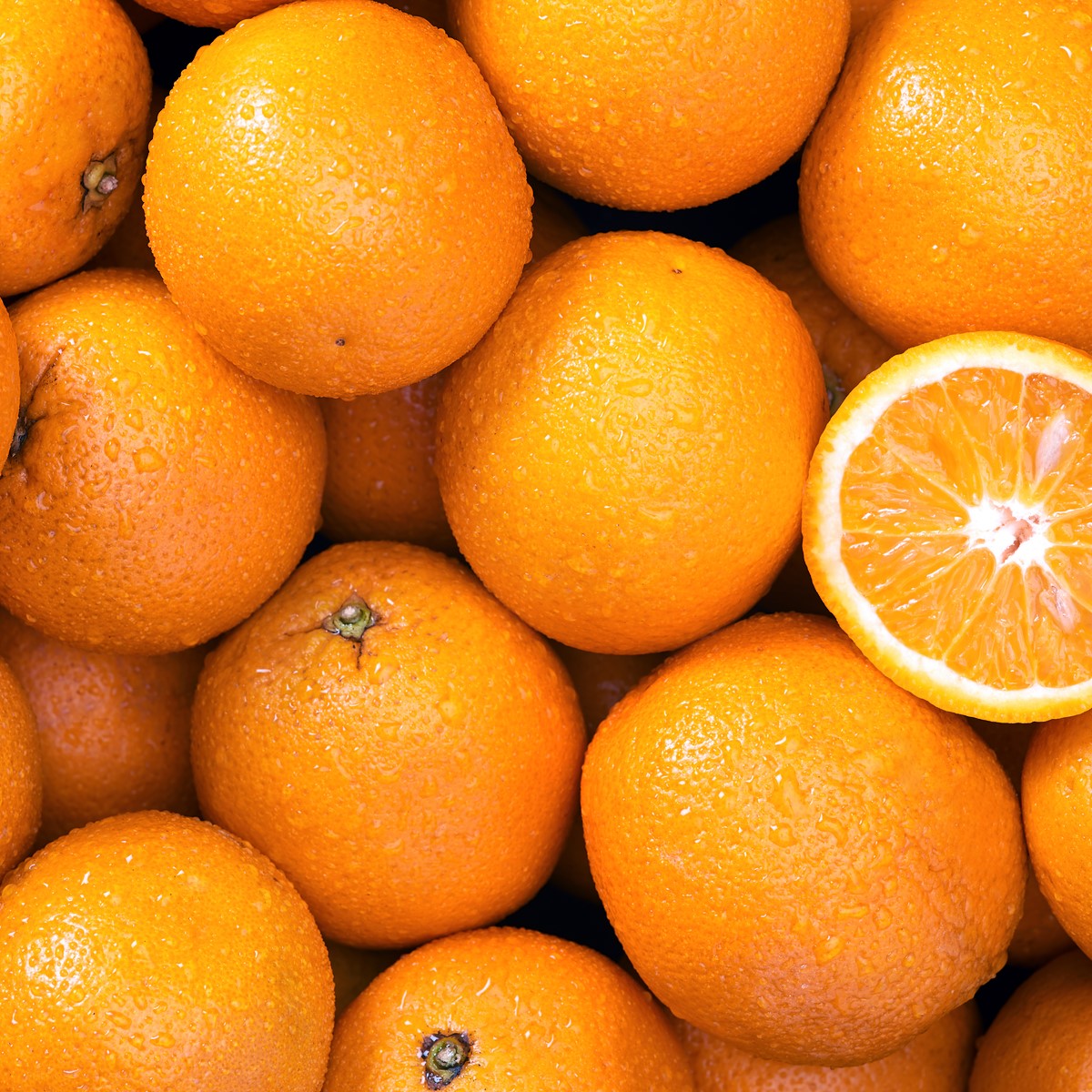 Orange peel oil featured in Dame Jo! products for brightening and energizing skin.